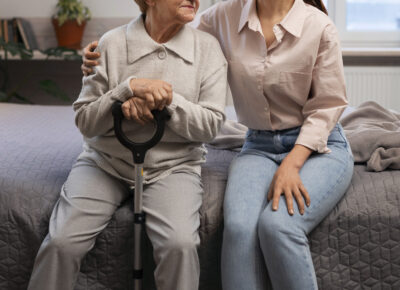 female-nurse-taking-care-elderly-person